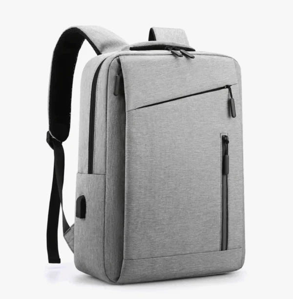 A Gray "nylone back pack" backpack with black straps on a white background