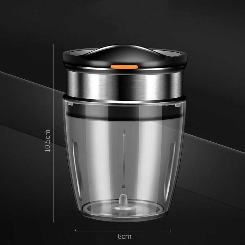 Kitchen Gadget With Integrated Fruit Cutter with black lid on a dark background showing size of gadget.