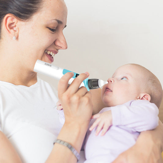 Woman holding a baby and using a Baby Nasal Aspirator Electric Cleaning Household, with a plain background