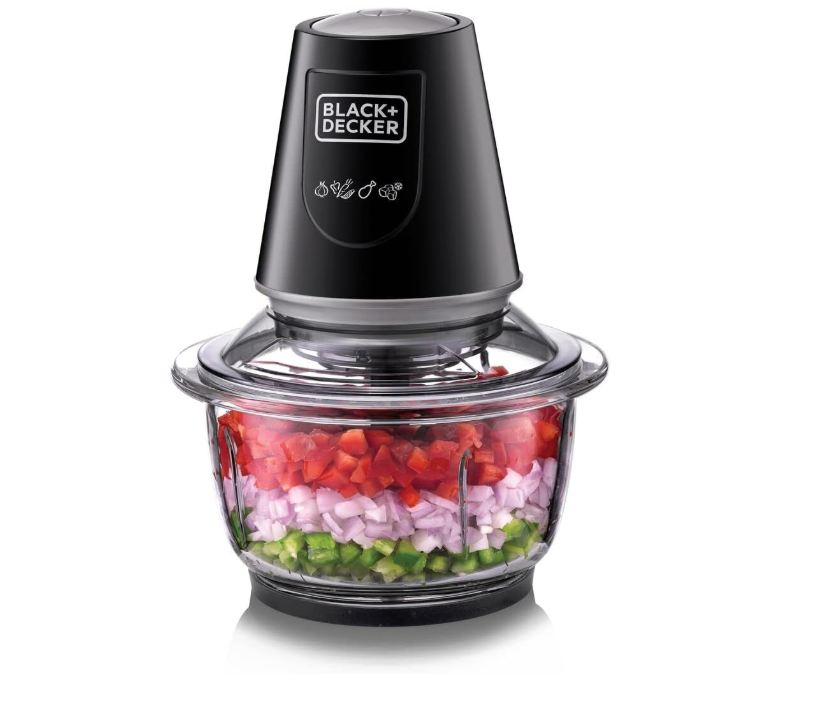 Black+Decker food chopper with chopped vegetables on a white background
