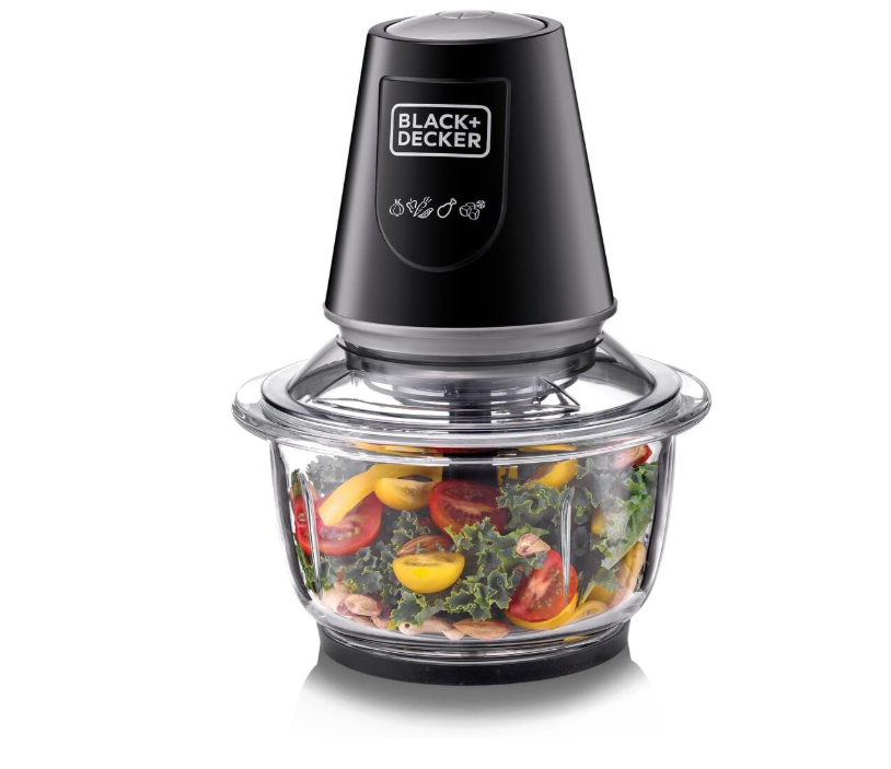 Black + Decker food chopper with vegetables inside on a white background