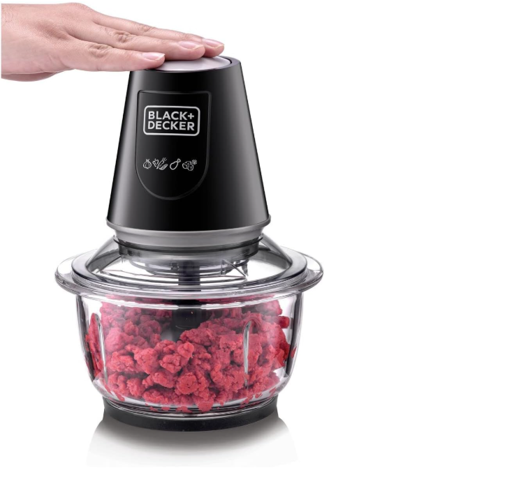 Black + Decker food chopper with ground red ingredients on a white background