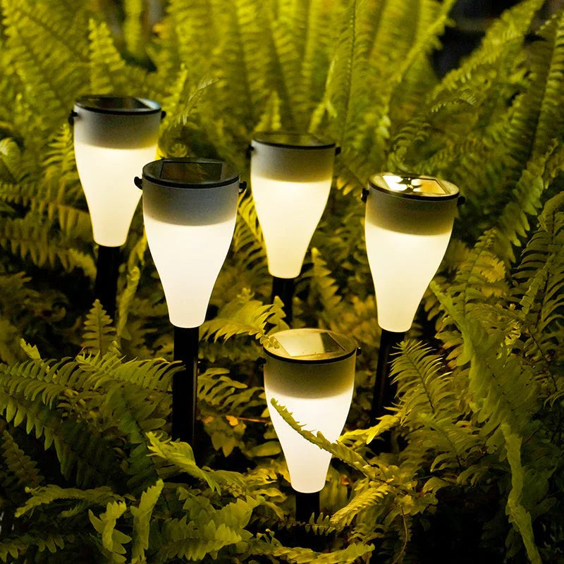 Solar Outdoor Water Decorative Street Light embedded in green foliage