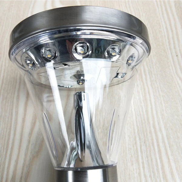 Solar Wall Light Chrome ceiling light fixture on a wooden surface