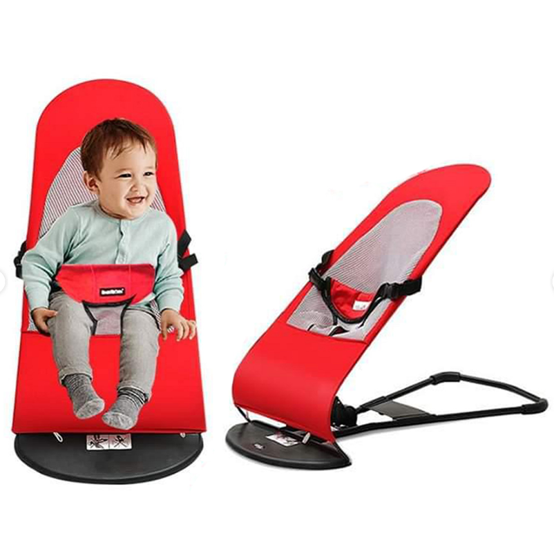 Red baby bouncer with a child sitting inside on a white background
