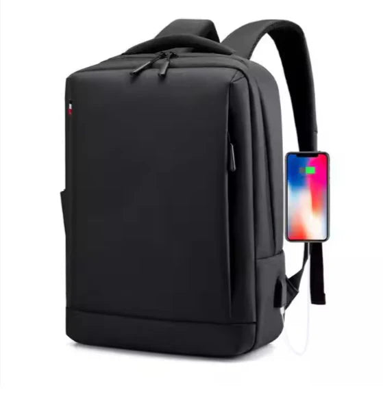 Black "carry craft bagpack" backpack with USB port and smartphone on a white background