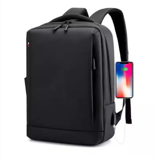 Black "carry craft bagpack" backpack with USB port and smartphone on a white background