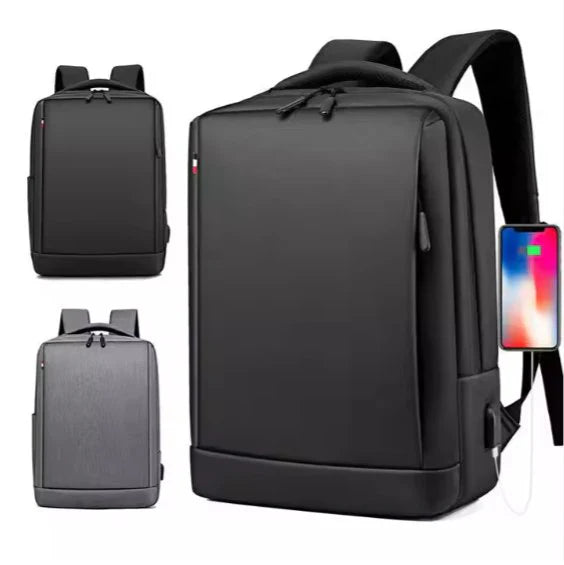 Black "carry craft bagpack" backpack with USB port and smartphone on a white background