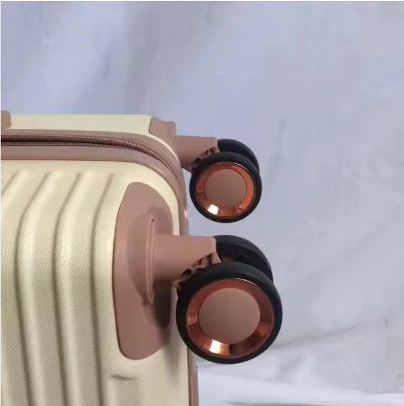 Beige Custom Travel Luggage with black wheels on a light gray background