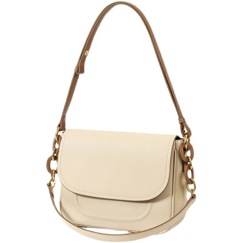 Beige high-grade cowhide underarm-bag fashion all matching with a chain detail on a white background
