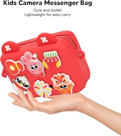 Kids Trendy Satchel camera messenger bag with cartoon character designs held by a hand on a white background