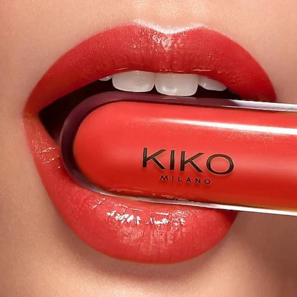 Kiko Milano lipstick being applied to a red lip